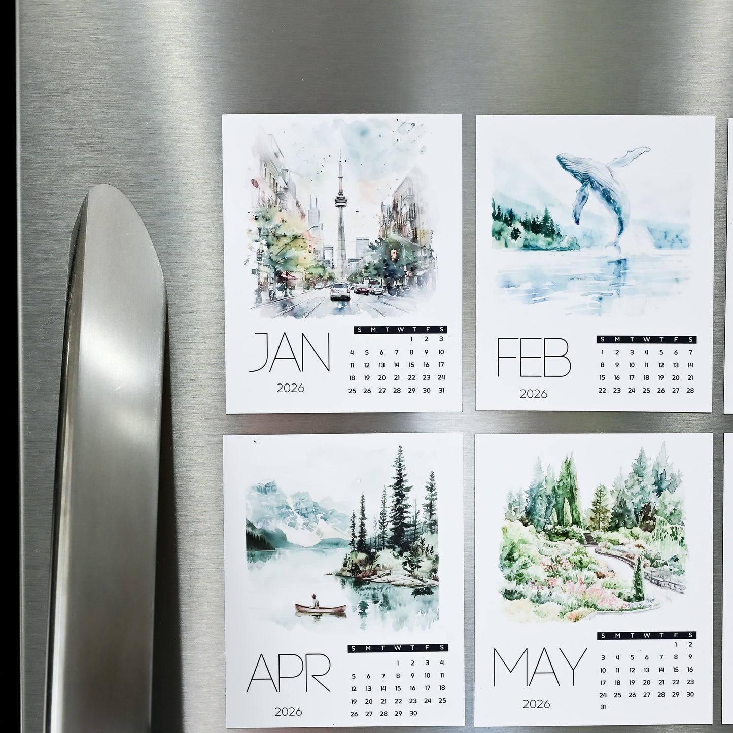 Four-month Custom Photo Magnet calendar on a refrigerator with scenic illustrations