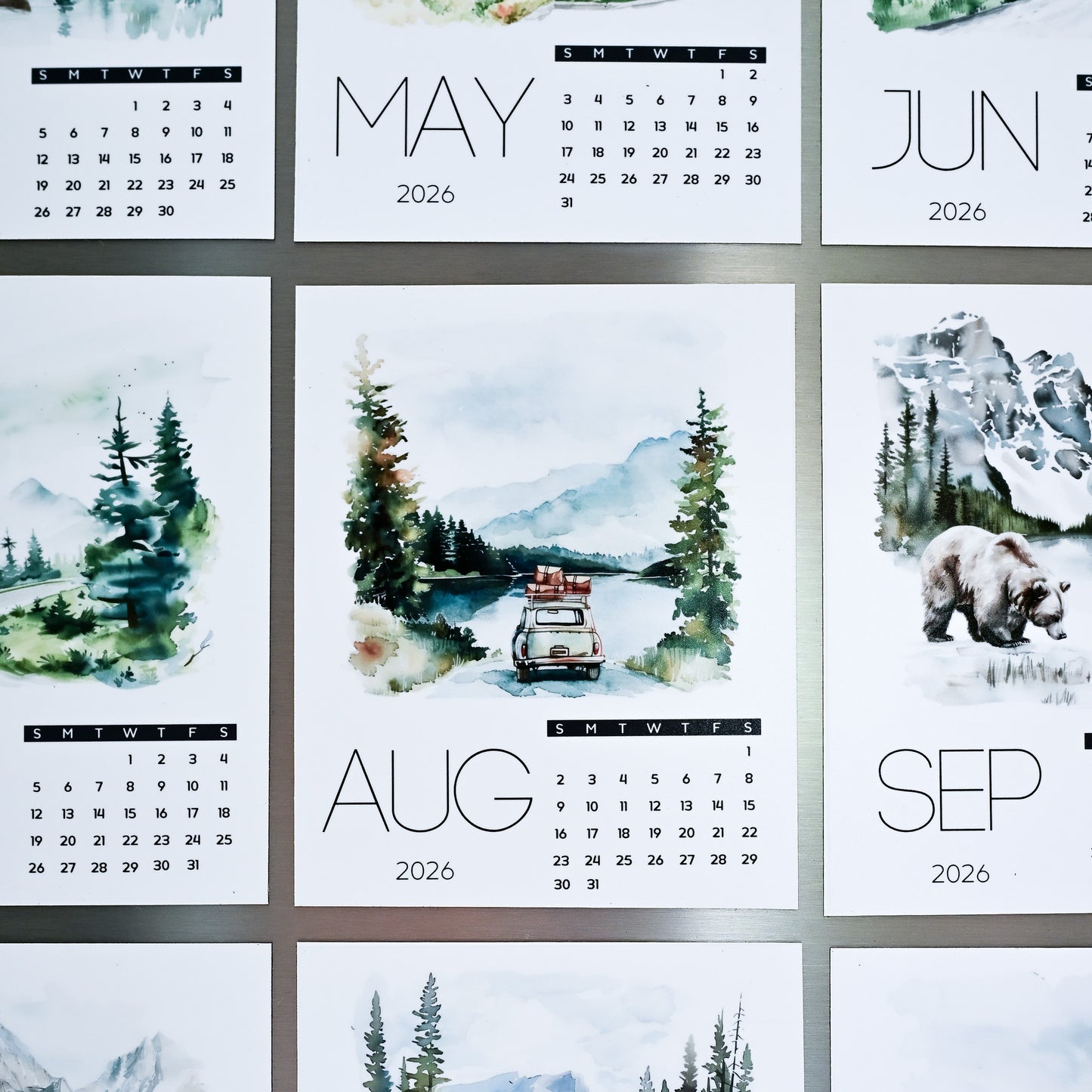 Custom Photo Magnet Calendar grid showing months from May to September 2026 with scenic illustrations.