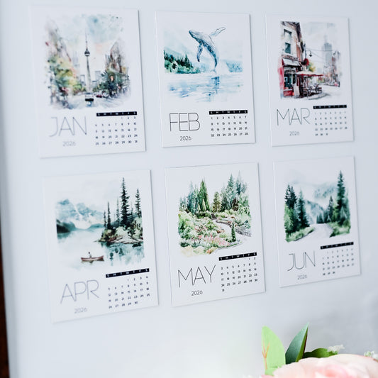 Custom Photo Magnet Calendar with scenic images for each month on a white background