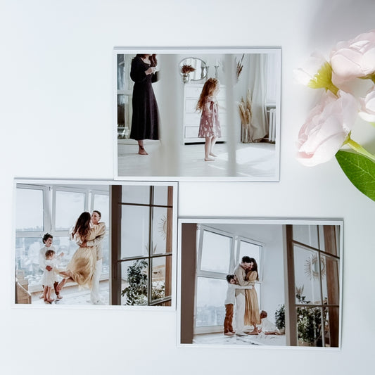 Collage of family photo magnets with a white background and floral elements.